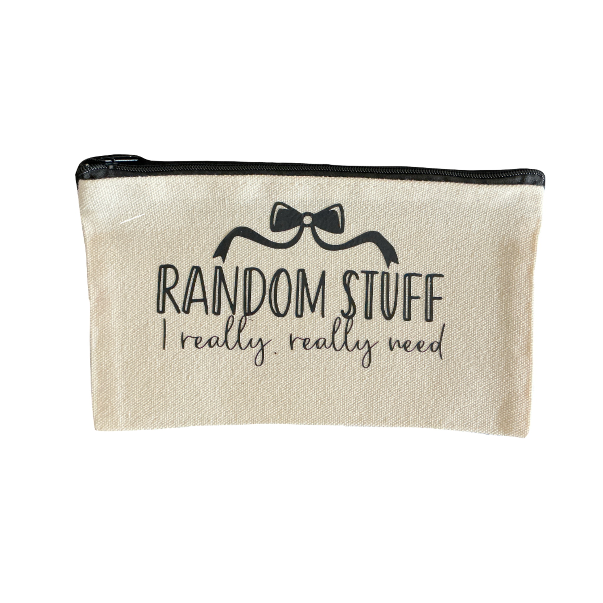 Liten tygväska med texten "Random Stuff I really, really need"